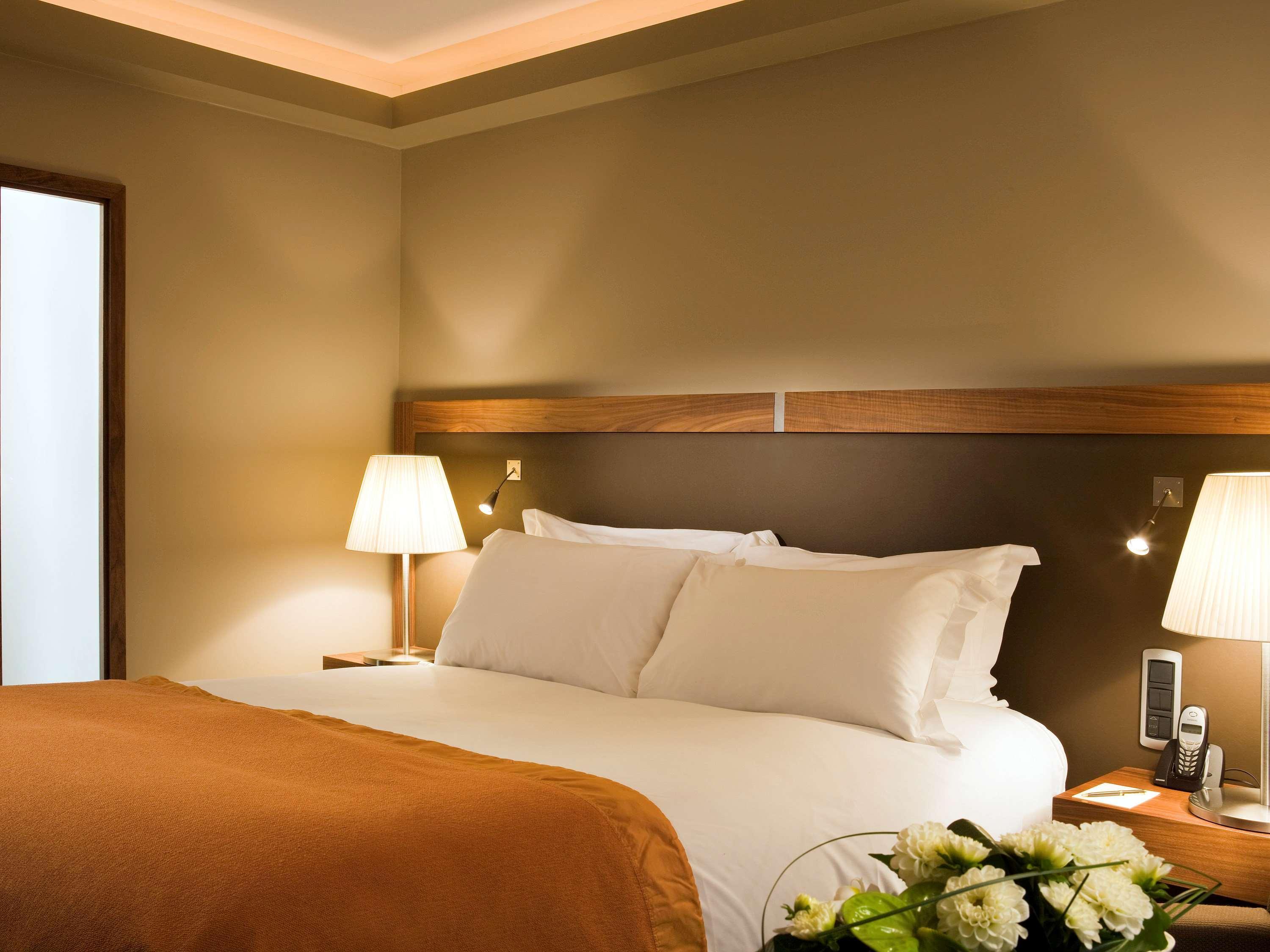 Hotel Sofitel Lyon Bellecour Esterno foto A bedroom at the hotel