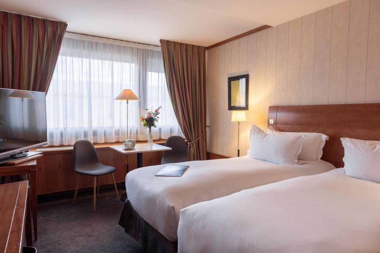 Hotel Sofitel Lyon Bellecour Esterno foto A typical room at the hotel