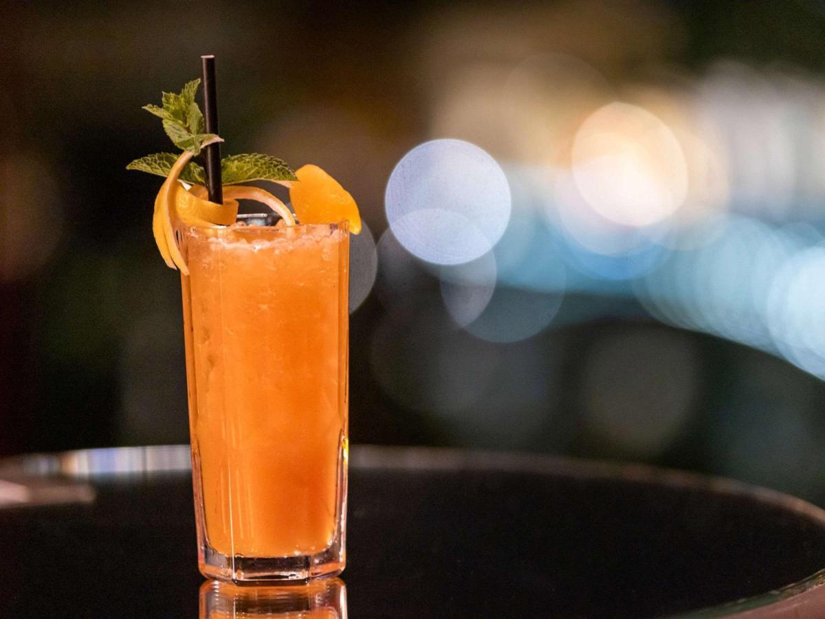 Hotel Sofitel Lyon Bellecour Esterno foto A screwdriver cocktail